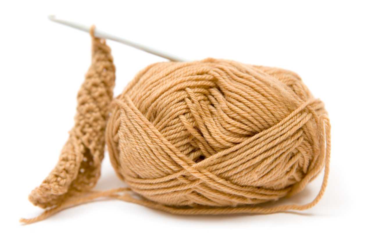 crochet-hook-and-brown-wool